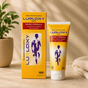 Lurlaxy warm formula product packaging on a wooden surface with a plant and towel in the background