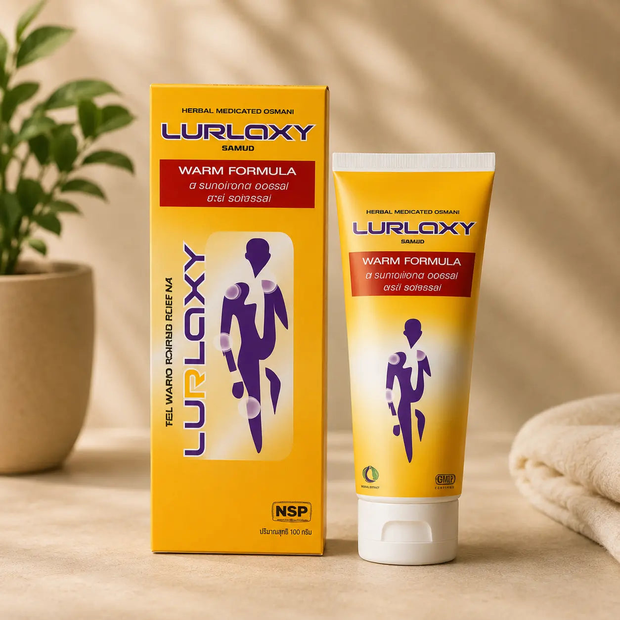 Lurlaxy warm formula product packaging on a wooden surface with a plant and towel in the background