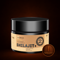 Jar of Shilajit supplement with RahuRula branding on a dark background