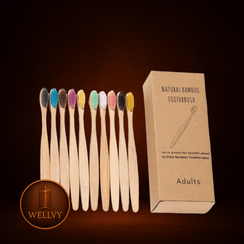 Set of bamboo toothbrushes with a cardboard box on a dark background, featuring the Welly brand.